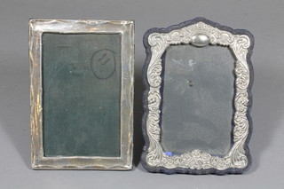 A plain silver easel photograph frame Chester 1916 6.5" x 4.5"  and a silver plated easel photograph frame
