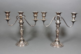 A pair of silver plated 3 light candelabrum with bead work  decoration