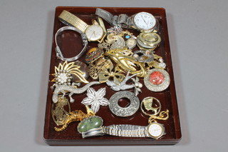 A collection of costume jewellery, wristwatches, brooches etc