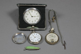 A Victorian pocket watch by W J Lassiter of Arundel contained  in a silver case, f, London 1869 together with an Omnibus  Continental open faced pocket watch in a silver plated case, a  curb link chain, small folding pocket knife and a travelling  timepiece
