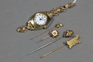 A lady's wristwatch with 9ct gold bracelet and 4 stick pins