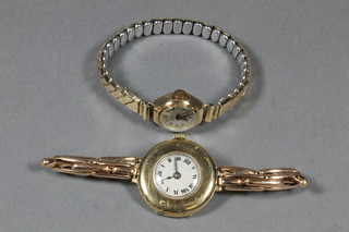 A lady's Abia wristwatch contained in a gold case and 1 other