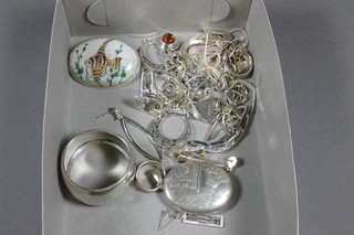 An oval engraved silver locket, 2 silver bracelet, a silver napkin  ring and various silver costume jewellery