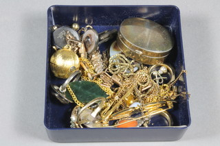 An oval modern silver pill box with hinged lid and a small  collection of costume jewellery