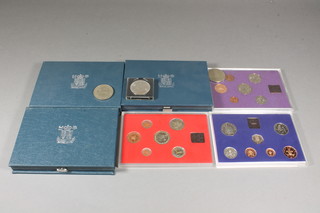 6 British proof coin sets 1980 - 1985, a Coronation crown, a Churchill crown and a 1977 Silver Jubilee crown