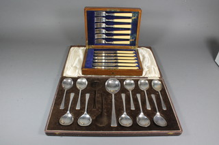 A set of 6 silver plated fish knives and forks complete with  canteen box and 10 silver plated fruit spoons and server by   Elkingtons, cased