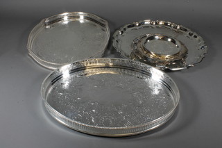 2 shaped silver plated galleried tea trays 15" and 7 silver plated salvers