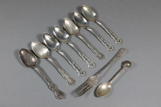 A silver teaspoon decorated a bowling wood and a set of 6  American Sterling silver coffee spoons, a silver fork and a silver  spoon, 5 ozs