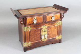 A Japanese burr elm Kodansu, fitted 2 small drawers above 2 cupboard doors enclosing a further 3 drawers, 10"h x 14"w x 8"d