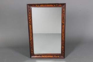 An early 19th Century Dutch walnut wall mirror, the cavetto frame decorated panels of floral marquetry, inset rectangular  plate, 21.25"h x 33.5"w