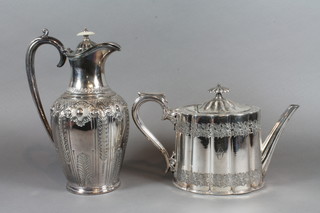 A Victorian oval engraved Britannia metal teapot by Walker &  Hall and a Britannia metal hotwater jug