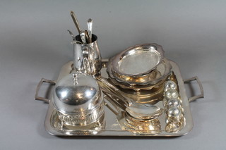 A rectangular silver plated twin handled tea tray by Harrods, 4 silver plated pepperettes and a collection of various plated items