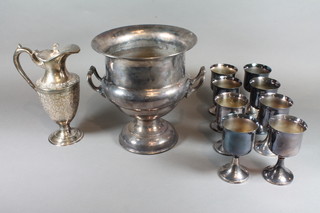 A silver plated twin handled wine cooler, a silver plated goblet and a Britannia metal hotwater jug