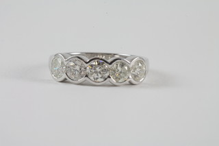 An 18ct white gold engagement/dress ring set 5 diamonds,  approx. 1.78ct