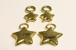 2 18ct gold star shaped pendants 4.0 grams and 2 gilt metal  shaped pendants