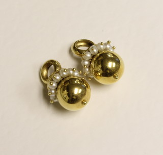 A pair of 18ct gold pendants set pearls 9.2 grams