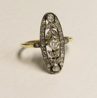 An 18ct white gold boat shaped dress ring set diamonds