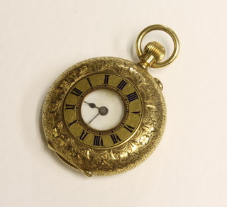 A half hunter fob watch contained in an 18ct Continental  engraved gold case