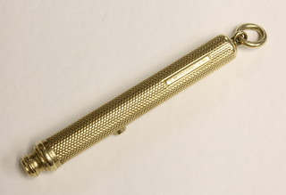 A propelling pencil contained in a gilt case by Morden