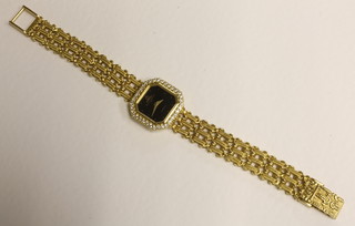 Baume & Mercier, a ladies quartz dress wristwatch contained in an 18ct gold case with integral gold bracelet, set diamonds to the  bezel