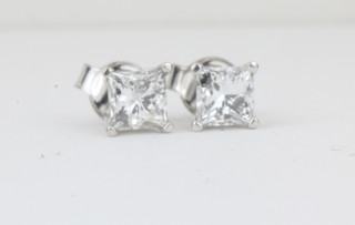 A pair of 14ct gold square cut ear studs, approx 1.40ct