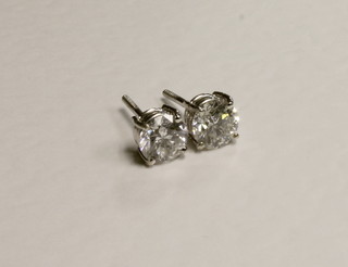 A pair of 18ct ear studs set diamonds, approx 2.05ct