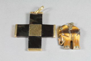 A hardstone brooch in the form of a standing elephant and a gilt mounted Greek cross