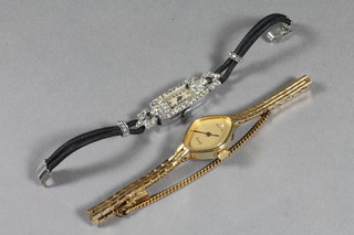 A ladies cocktail wristwatch contained in a silver case together with a Avia wristwatch in a gilt case