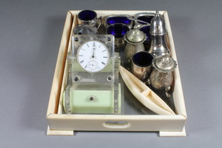 A rectangular ivory and glass dressing table tray on bracket feet 10" x 8.5", a carved ivory twin section salt 4.5", a pocket watch  movement mounted as a bedside clock together with silver plated  condiments