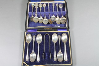 5 silver Old English pattern teaspoons, Sheffield 1931, 2 ozs - cased, a pair of plated tongs and teaspoon - cased, and 10  souvenir spoons - case