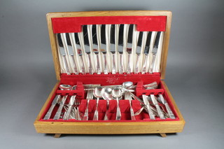 A canteen of Viner & hall silver plated flatware in an oak canteen  box