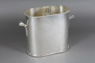 An oval silver plated twin handled wine cooler 7.5"