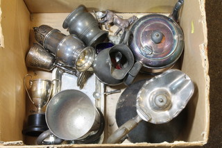 A silver plated hotwater jug and a collection of plated items
