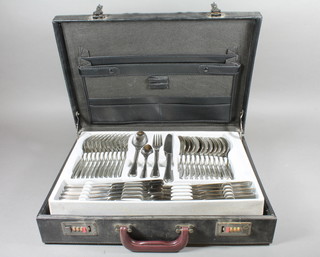 A canteen of chromium plated Old English flatware contained in  a briefcase