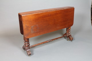 A Victorian mahogany Sutherland table, raised on turned  supports 28"h x 42"l x 6"d