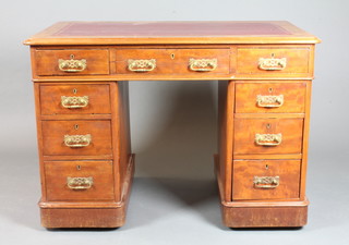 A Victorian walnut pedestal desk with inset red leather skiver above 1 long and 8 short drawers 30"h x 41"w x 24"d