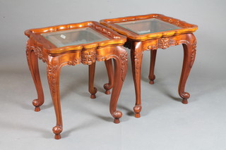 A pair of Victorian style square carved mahogany lamp tables with inset bevelled plate glass panels, raised on cabriole supports  24"h x 22"w