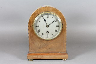 An Edwardian walnut mantel timepiece, the arch topped case  with chequer line inlay, silvered Roman dial set 8 day cylinder  movement with platform escapement, 9"h x 7"w x 5"d