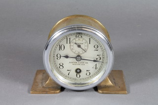 A car clock with silvered dial, Arabic numerals and subsidiary second hand by the Boston Clock Co. Boston USA, 3"