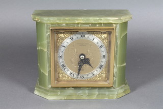 Elliott, a bracket clock with square gilt dial, silvered chapter ring and Roman numerals, contained in a green onyx case, retailed by  G H Pressley & Sons of Worthing 6"