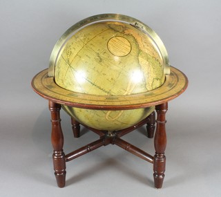 C & J Cary, 86 St James Street, London. A Regency "Cary's  New Terrestrial Globe", Exhibiting The Late Discoveries  Towards the North Pole, dated March 15th 1821, having  calibrated brass meridian ring with annular and zodiacal horizon  ring, raised on 4 baluster turned legs united by stretchers, 18"  diam. x 18"h  ILLUSTRATED FRONT COVER