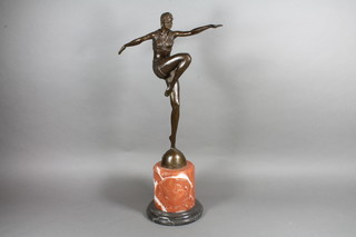 An Art Deco style bronze figure of a dancer, raised on a marble socle base 23"