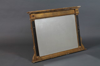 A Regency style gilt wood and parcel ebonised over mantel  mirror with moulded cornice and inset rectangular bevelled plate  flanked by reeded ebonised pilasters, plinth base, 27"h x 36"w
