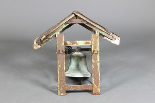 A 19th Century bronze bell 7" complete with iron cradle