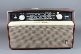 A Bush portable radio type VHF 81, contained in a mahogany  case