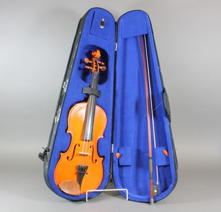 A childs violin - The Stentor Student 1, with 2 piece back 12.5" together with a bow by P&H of London, complete with plush  lined carrying case