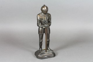 A metal table lighter in the form of a standing knight ?29"