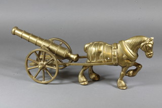A brass figure of a horse complete with cannon and gun carriage 18"