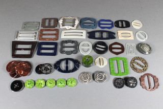A collection of 1930's buckles and buttons