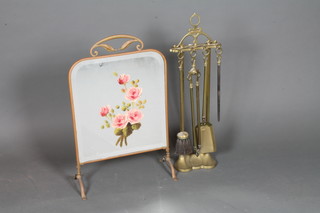 An Art Nouveau brass 4 piece fireside companion set comprising  poker, shovel, brush and tongs together with a brass and glass  fire screen